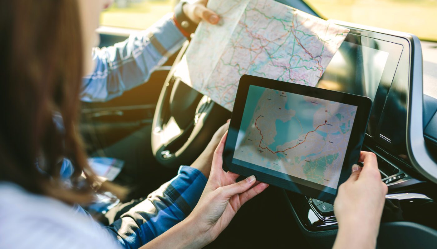 couple comparing paper map and a gps navigator 2021 08 30 05 21 46 utc 1400x800 - GPS receiver - how it works and what it is used for