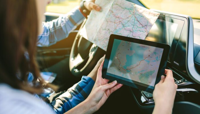 GPS receiver - how it works and what it is used for couple comparing paper map and a gps navigator 2021 08 30 05 21 46 utc 701x400 - GPS receiver - how it works and intended use