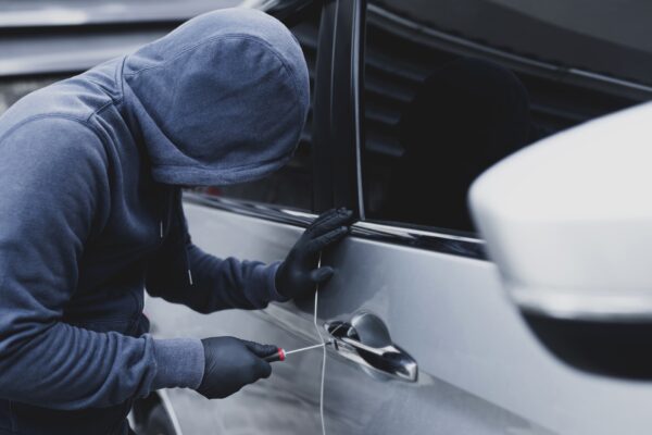 the thief is stealing the purse in the car 2021 10 14 01 13 11 utc 600x400 - Car theft - How to prevent this?