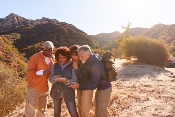 Topo GPS - What is it anyway? group of senior friends checking gps on mobile pho 2021 08 27 22 41 07 utc 600x400 - Topo GPS - What is that anyway?