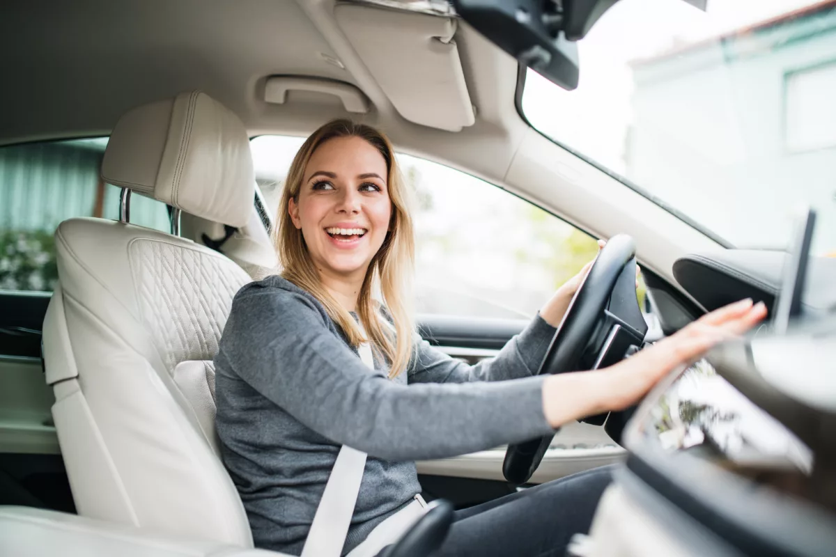 young woman driver sitting in car driving 2021 08 27 16 15 11 utc 1200x800 - The right car for beginner drivers